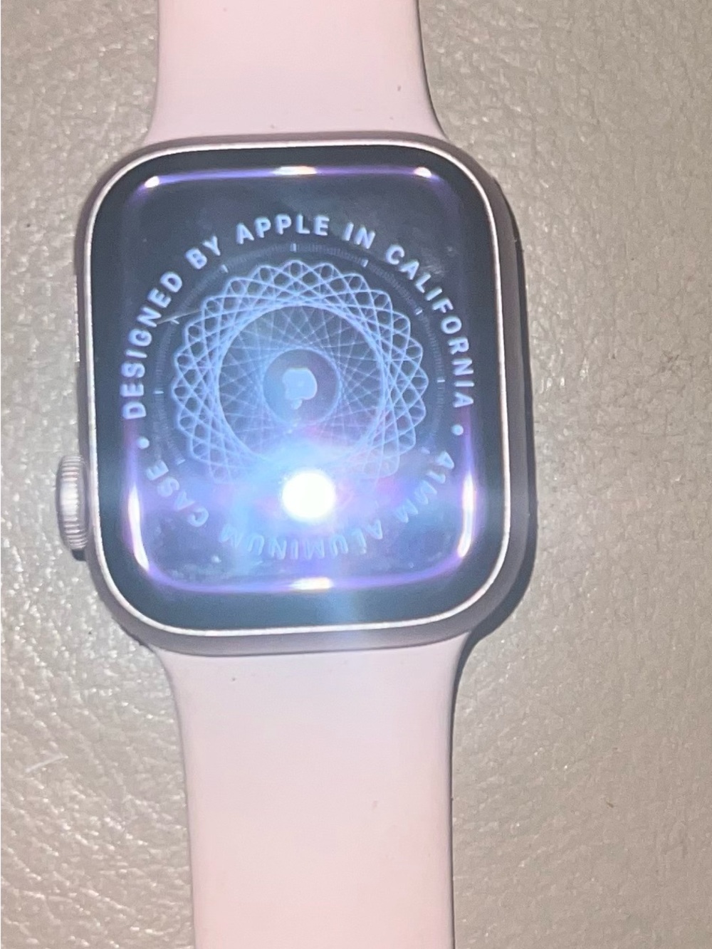 Apple Smartwatch with Light Pink Sport Band and Silver Aluminum Case